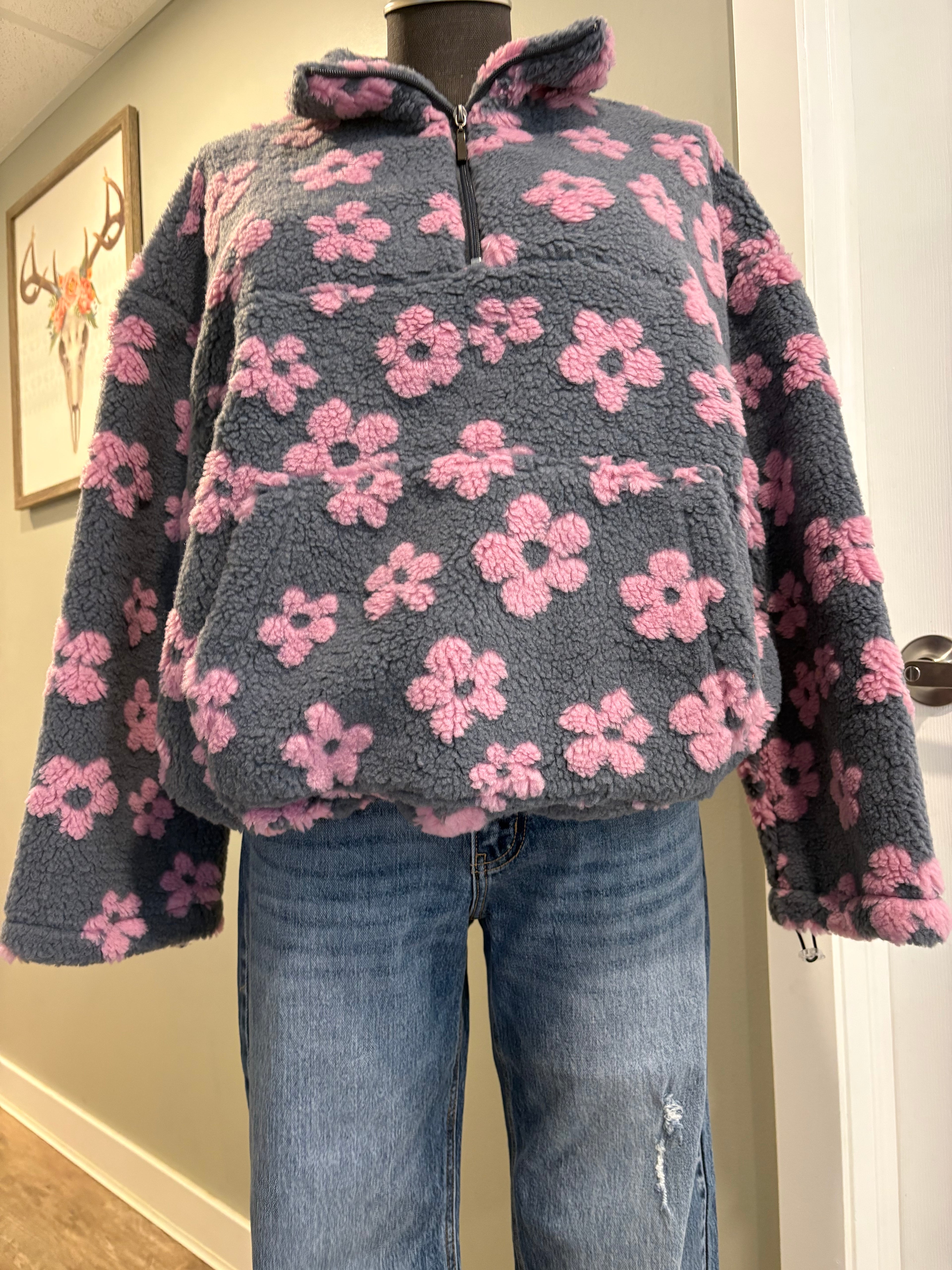 Floral sherpa pullover with flower pattern and half-zip design