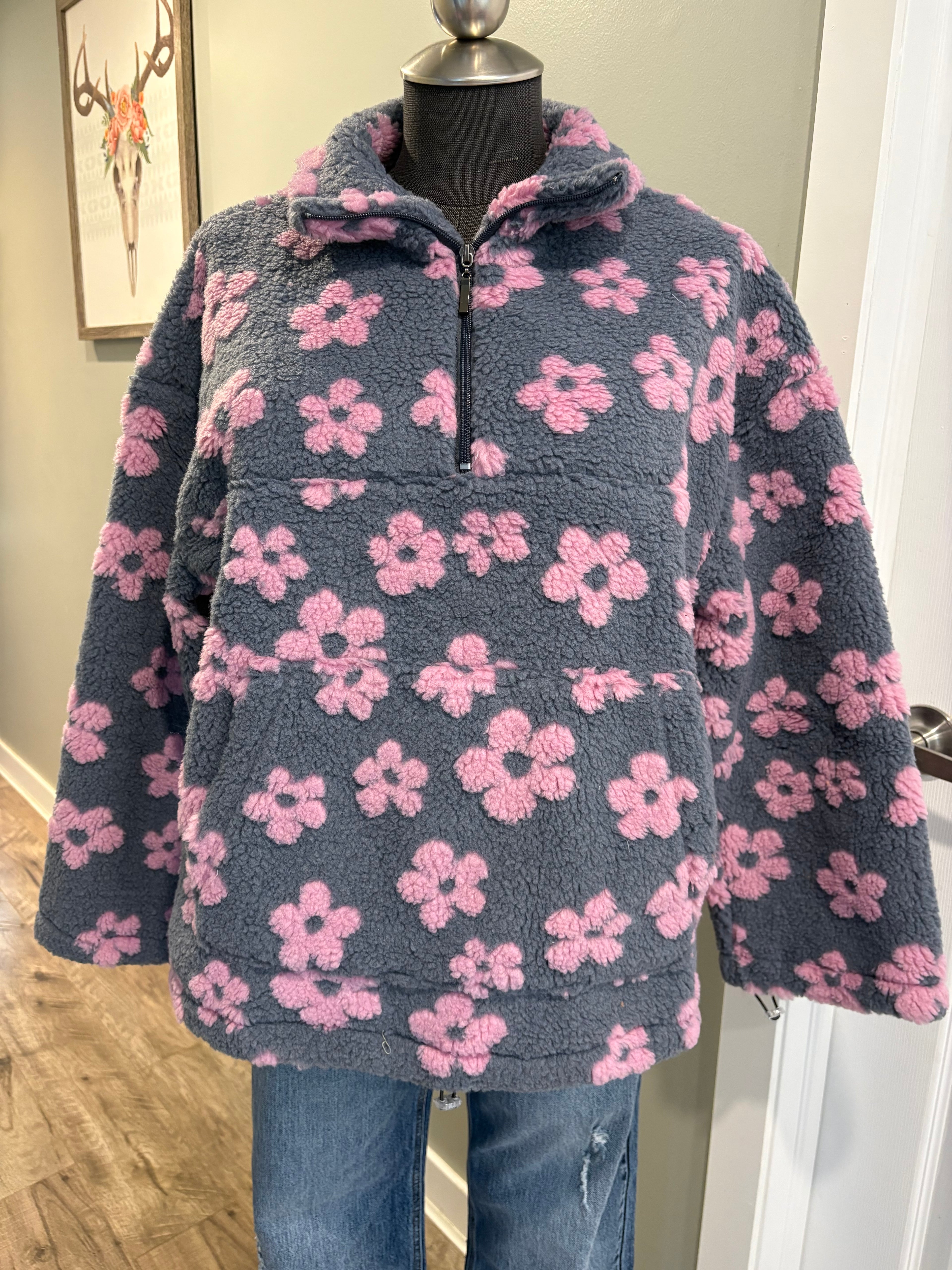 Floral sherpa pullover with flower pattern and half-zip design