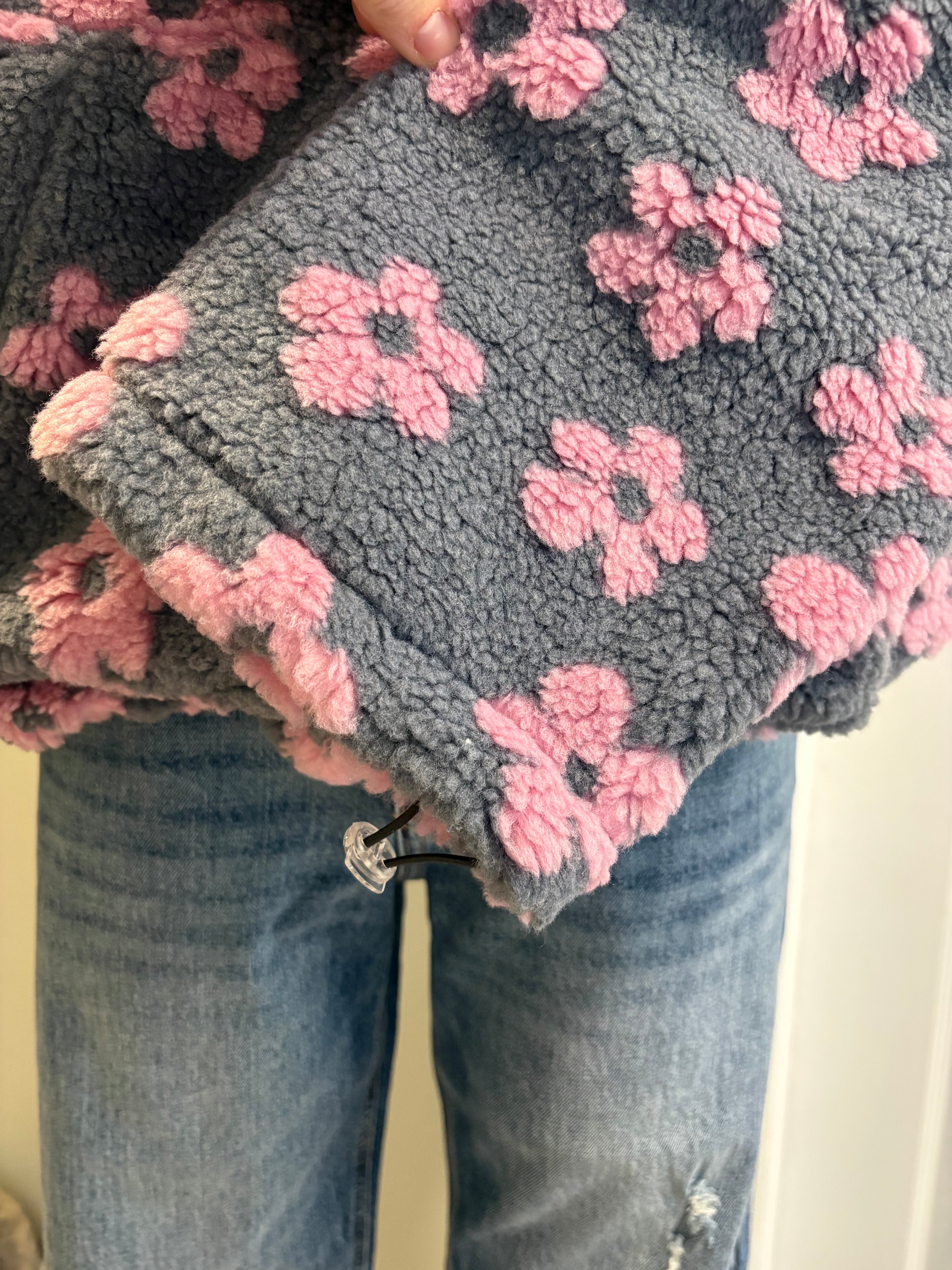 Floral sherpa pullover with flower pattern and half-zip design